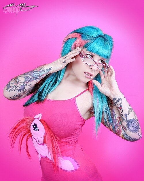 blue haired girl with pink My Little Pony strap dress