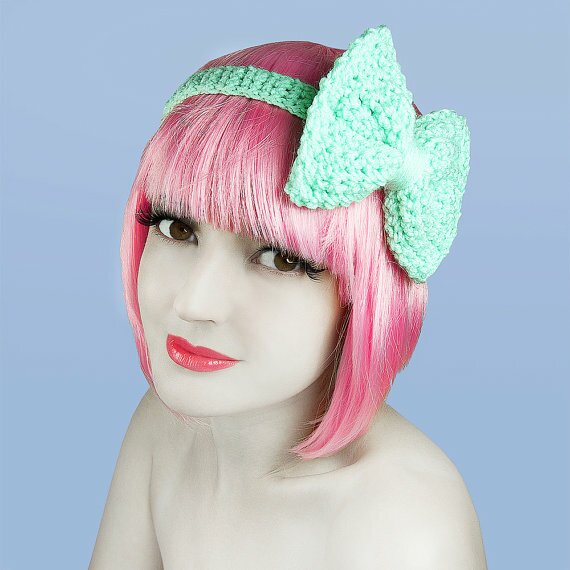 Mint green crocheted hair band with a bow