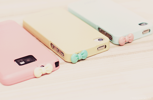 Pastel pink, yellow and blue Iphone cases with bows